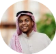 "Smiling man in traditional Middle Eastern attire portrait"