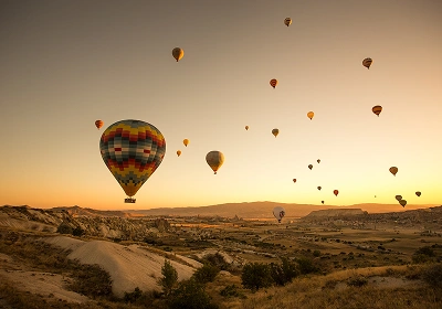 Hot Air Balloons Over Cappadocia, Turkey at Sunrise