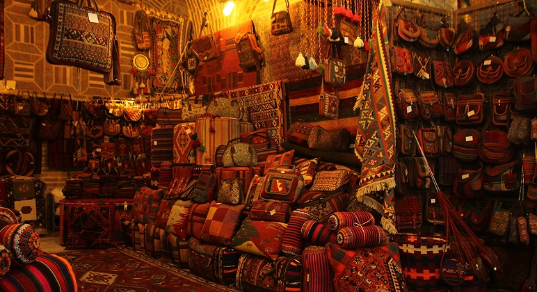 Traditional Persian bazaar stall with rugs