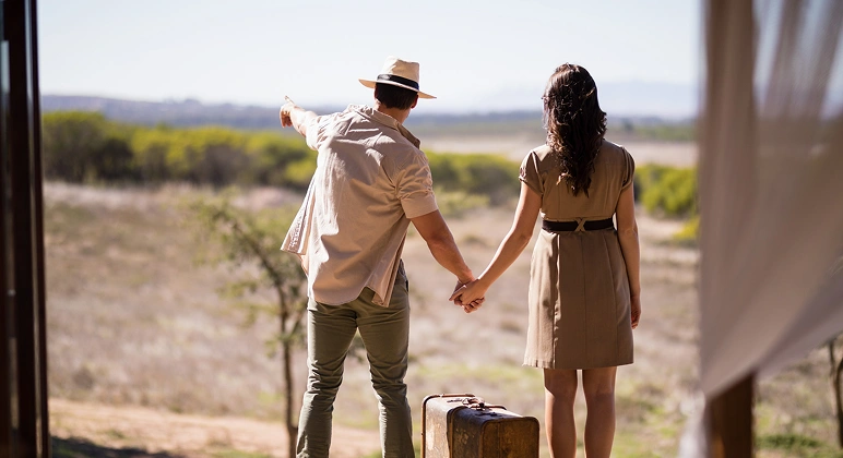 Couple enjoying romantic African safari honeymoon